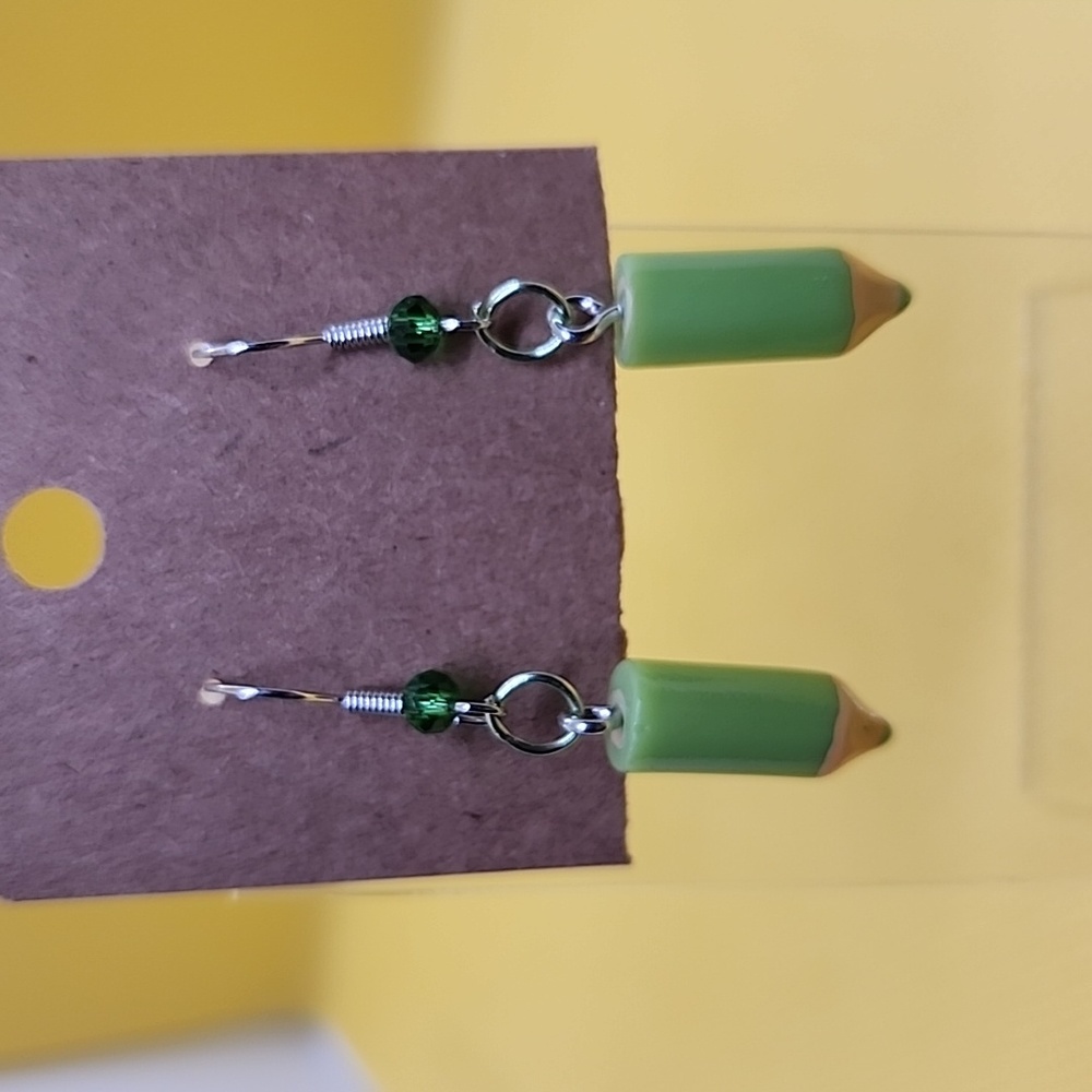 Green colored pencil earrings